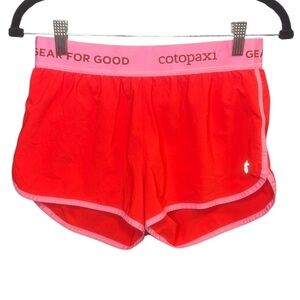 Cotopaxi Orange Crux Shorts with Pink Accents